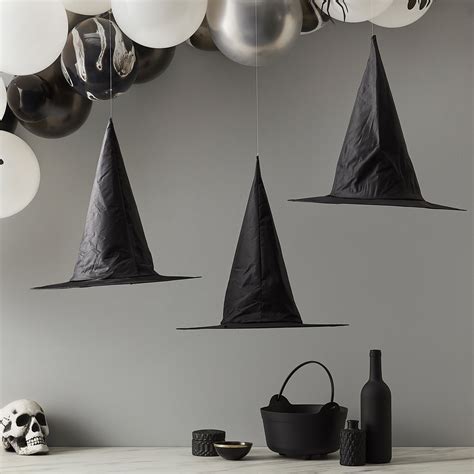 Witchy Wedding Decor: Hanging Witch Hats for a Magical Ceremony